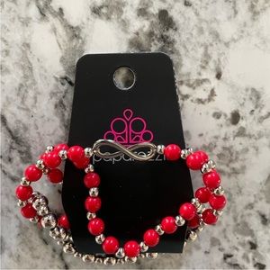 Beautiful women’s red and silver infinity charm bracelet